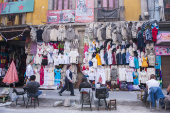 Mexico City Market vendor selling clothes